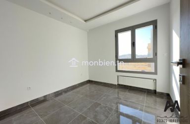 Appartement s+2 vide avec parking sous sol à AFH² Mrezga